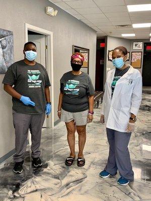 Wearing our masks & matching t-shirts!