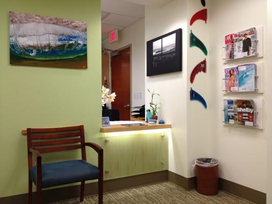 By the judge of the paintings/photos on the wall... Dr. Uyehara must be a surfer or in love with the beach!