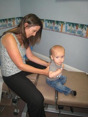 Dr. Campagna adjusting Carter at 13 months old.