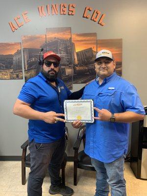 Majid presenting me with my CDL completion certificate.