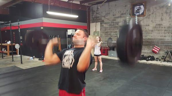 Jimmy and Kat push pressing in the WOD!