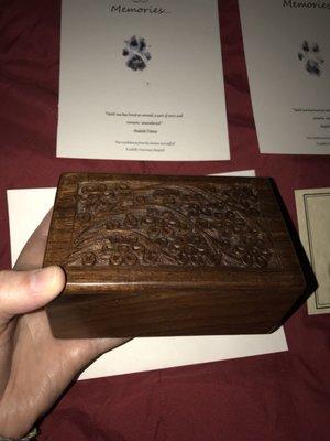 Beautiful carved wooden box. Cards with his paw print and a certificate. Truly grateful for the compassion they showed.