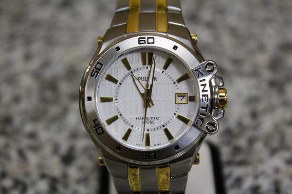 Pulsar PAR147 Kinetic Two-Tone Stainless-Steel Bracelet Two-Tone Case Silver-Tone Dial Transparent Case Back Watch.