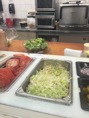 Brown wilted lettuce. That's the salad they were trying to give me on the counter.