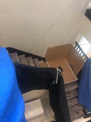 The movers were so careful as to lay cardboard down to ensure that the floors were not damaged during the moving process.