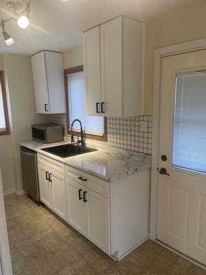 New Shaker cabinets and marble look countertops