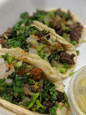 Beef tacos (hot sauce added by me)