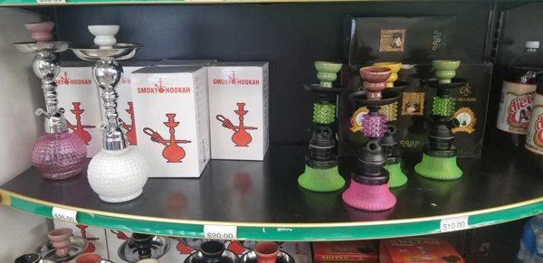 Check out our cute pink and lime green smaller hookahs. Prices range from $10.00-$100.00.