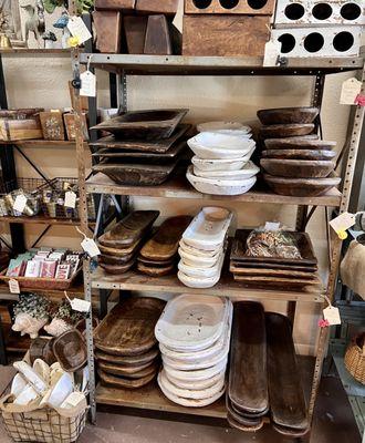 Several sizes and shapes of wood carved dough bowls