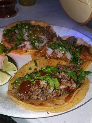 2 asada tacos and 2 al pastor tacos