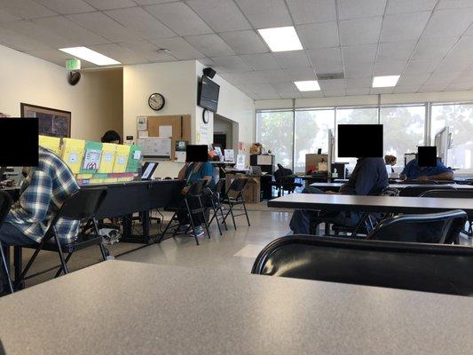 Thursday, June 7, 2018: client waiting area and desks where clients meet with volunteers.