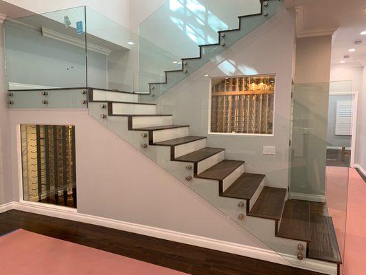 A custom cellar designed and built beneath a stairwell in LA.