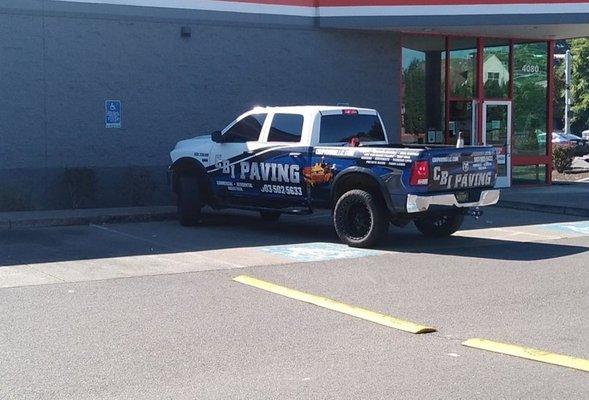 Here's their company truck taking up not one but TWO handicapped spaces. When asked what they were doing they got verbally abusive.