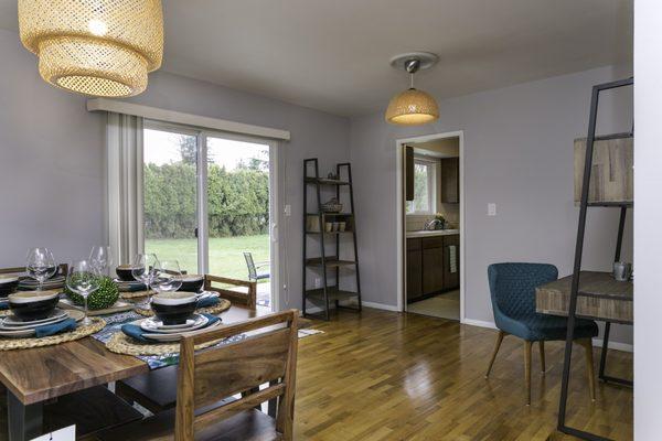 Open dining room with some flex space off the kitchen. Original hardwood floors. Alabama Hill, Bellingham, WA