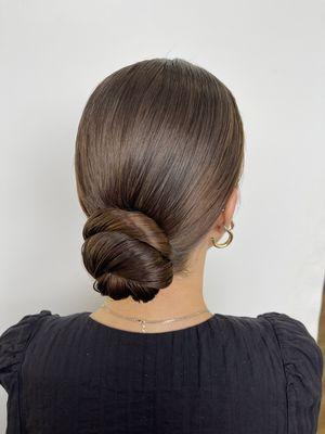 Sleek bun for special occasion