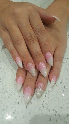 Pink and white Ombre with pointed almond shape.