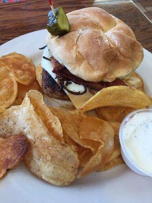 Pork tenderloin sandwich with homemade chips.