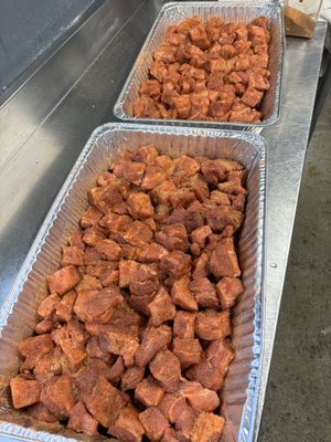 Pork belly burnt ends getting a Rub down