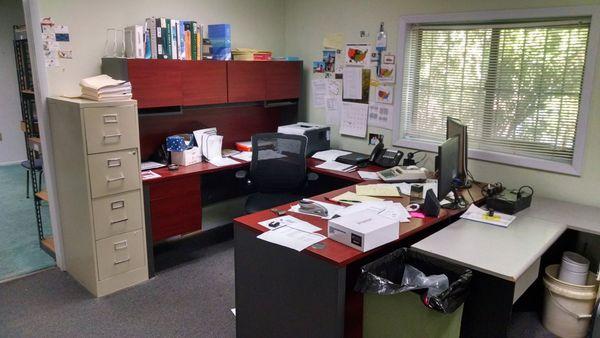 President's office. He's the guy you see with the tool kit!  Notice the Hurricane Window.