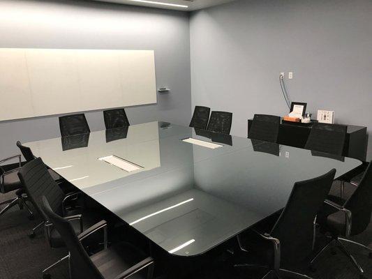 A custom glass top for a conference table.