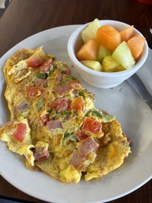 Western Omelet with cup of fruit.