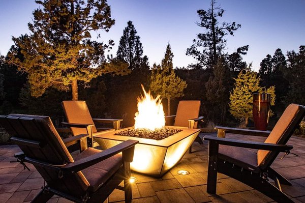 Custom fire feature with landscape lighting