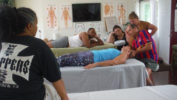 George teaching other therapists Integrated Modalities Bodywork at his learning expereience, Hawaii Bodyworkers Retreat