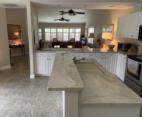 Kitchen sink island plus wall-attached countertop