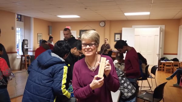 Rev. Jane makes a pinewood derby car with the Cub Scouts