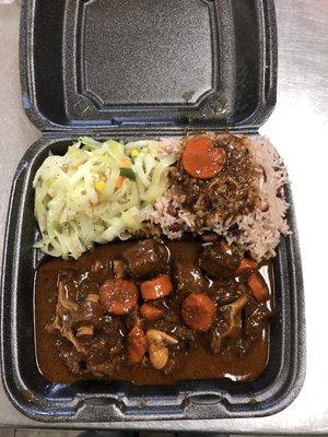 Oxtail Dinner 
 -Rice & Peas 
 -Cabbage