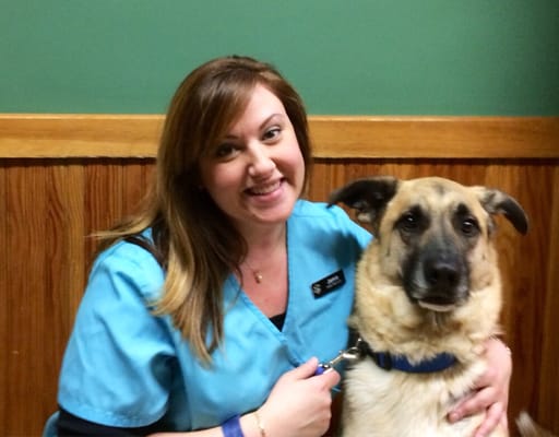 Receptionist Jamie with her dog, Bo.