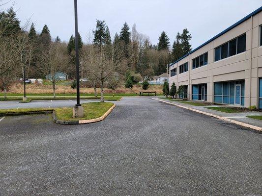 Parking lot outside main entrance of building