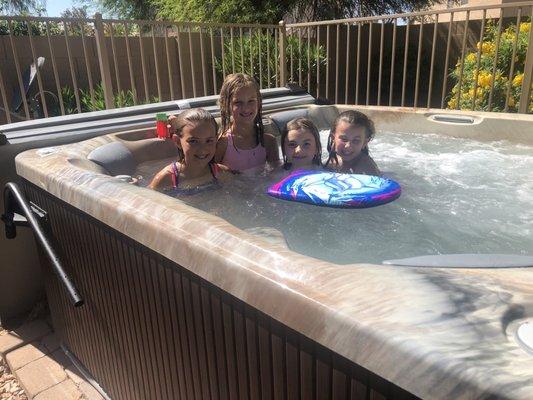 Kids having a blast and enjoying the hot tub. I cooled it down overnight and they loved using it as a mini pool.