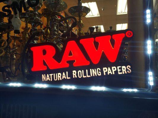 Raw rolling papers sign