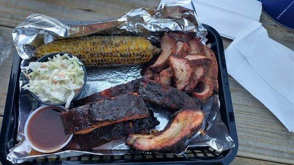 The 4 meat sampler. I got two orders of ribs and tri tip, corn on the cob and slaw.