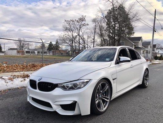 Satin White Pearl Car Wrap of a BMW M3