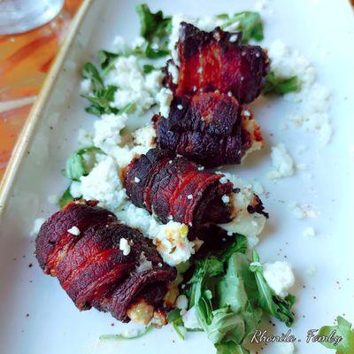 Bacon wrapped dates with goat cheese.  Don't let the burn appearance fool you.  They were delicious!