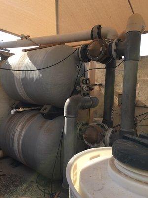 Two horizontal commercial sand filters