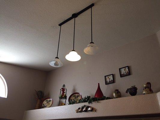 Kitchen light assembly installation.