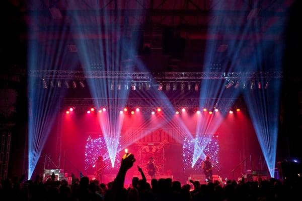 Professional concert production including audio, lighting, and staging equipment.