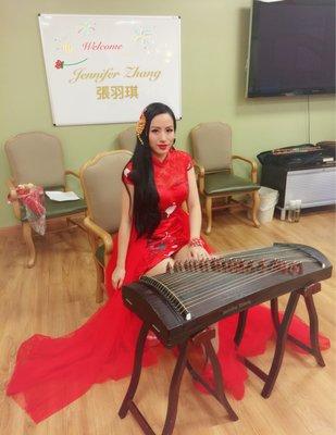 Playing the Chinese Zither (Guzheng) at rehearsal of the Chinese New Year Concert.