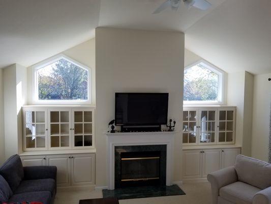 Built ins flanking fireplace