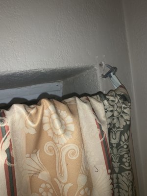 Curtain rod falling off wall