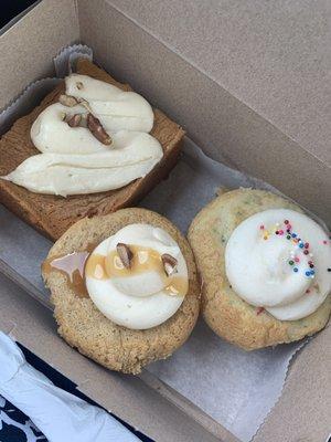 Cinnamon roll cake, sweet potato cupcake and a birthday cake cupcake! This place is amazing! Delicious treats and amazing customer service!!