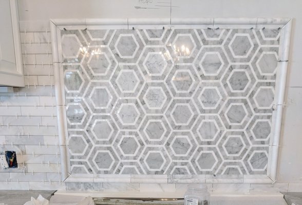 White carrara marble mosaic backsplash