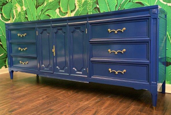 Mid-century nine-drawer dresser by American of Martinsville finished in high gloss blue