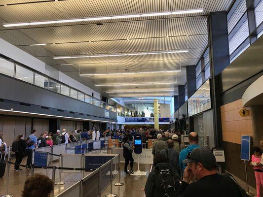 Waiting in the TSA-Precheck Line.