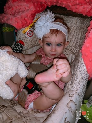 On a car ride!  ( one of the little girls I watch)