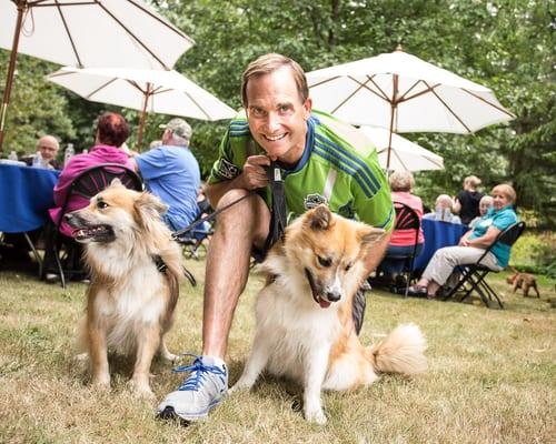 Dr. Tom and his two Icelandic Sheep Dogs at the practice's annual Dogs, Dogs, Dogs party.