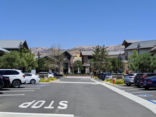 Main entrance to The Vineyards at Porter Ranch with view of Santa Susana Mountains